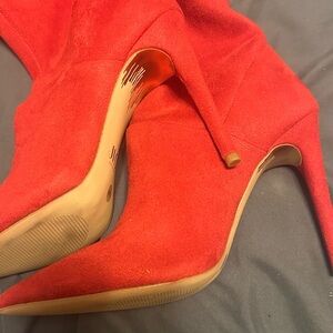 Jennifer Lopez Bold Red Over-the-Knee Boots